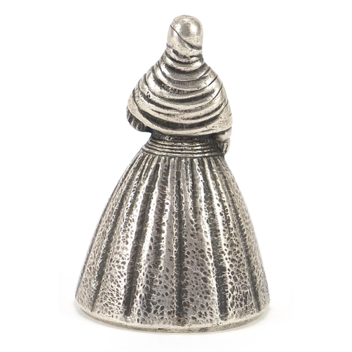 2263 - Peruvian sterling silver table bell in the form of a female in a dress, impressed A Mano, 7.5cm high... 