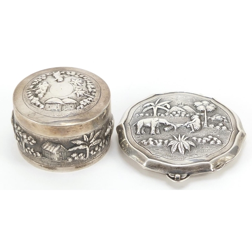 2271 - Indian sterling silver circular box and cover and compact, each embossed with figures and animals, t... 