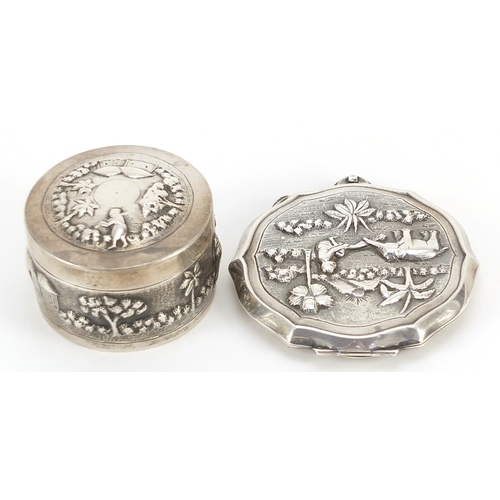 2271 - Indian sterling silver circular box and cover and compact, each embossed with figures and animals, t... 