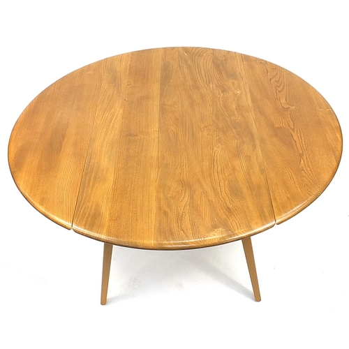 844 - Ercol light elm drop leaf dining table, 71cm H x 120cm W x 63cm D when closed