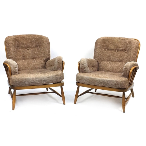 873 - Ercol Jubilee three piece suite with lift off cushions comprising two seater settee and two armchair... 