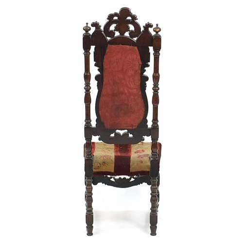 877 - Victorian mahogany high back chair with needlepoint upholstered back and seat profusely carved with ... 