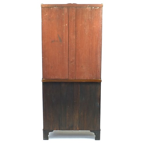 824 - Georgian style mahogany bookcase on stand with brushing slide and four drawers on bracket feet, 82.5... 