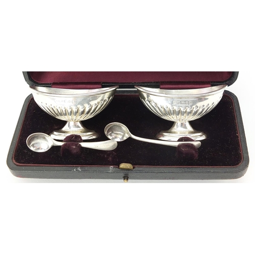 2224 - Nathan & Hayes, Pair of Victorian silver salts with a silver spoon and matched silver plated spoon h... 