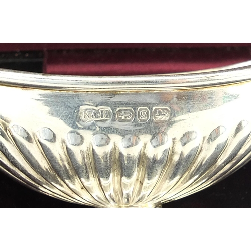 2224 - Nathan & Hayes, Pair of Victorian silver salts with a silver spoon and matched silver plated spoon h... 