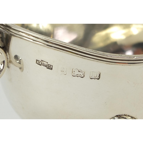 2238 - Asprey & Co Ltd, George V silver sauce boat raised on three hoof feet, Birmingham 1928, 14.5cm in le... 