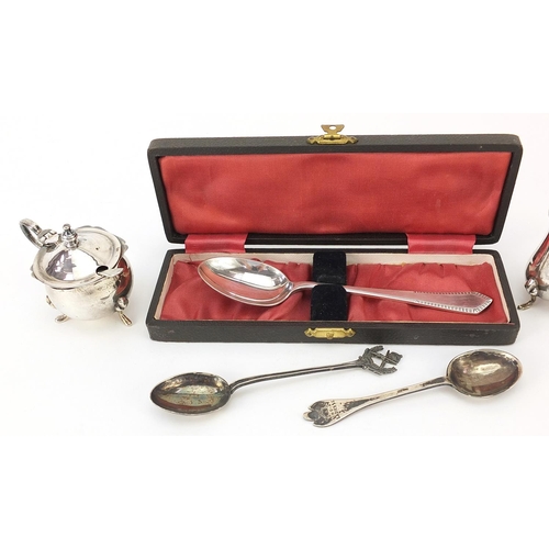 2243 - Silver objects comprising three piece cruet, spoon in fitted case and two Rifle Club teaspoons, vari... 