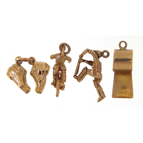 1748 - Four 9ct gold charms comprising cricketer, man on a unicycle, whistle and pair of shoes, the largest... 