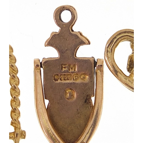 1711 - Four 9ct gold charms including lovebirds and an archer, the largest 2cm high, 6.7g