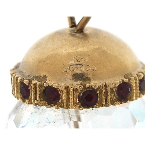 1860 - 9ct gold mounted crystal charm set with garnets, 3cm high, 12.5g