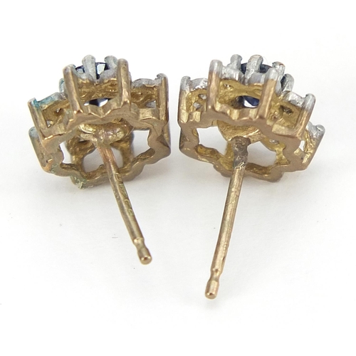 1957 - Pair of 9ct gold sapphire and diamond flower head stud earrings, 1cm in diameter, 1.4g