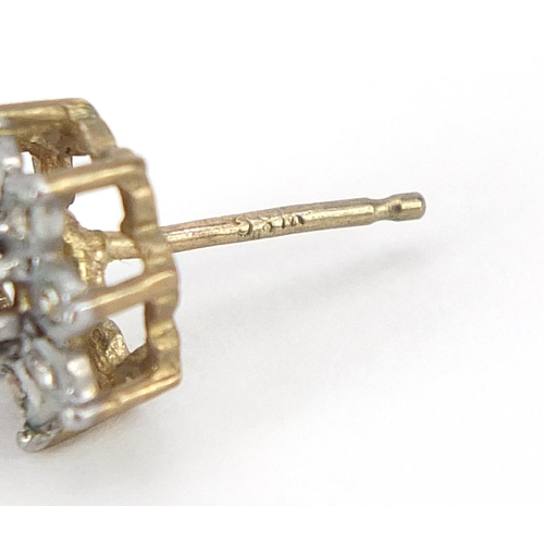 1957 - Pair of 9ct gold sapphire and diamond flower head stud earrings, 1cm in diameter, 1.4g