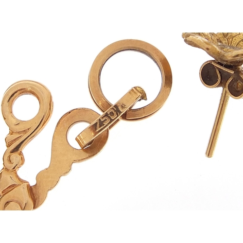 1919 - 9ct gold jewellery including a dolphin pendant and pair of scissors charm, the largest 3.5cm in leng... 