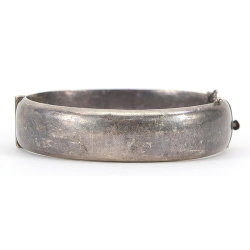 2163 - Victorian style silver hinged bangle with engraved decoration, 6.5cm wide, 24.8g