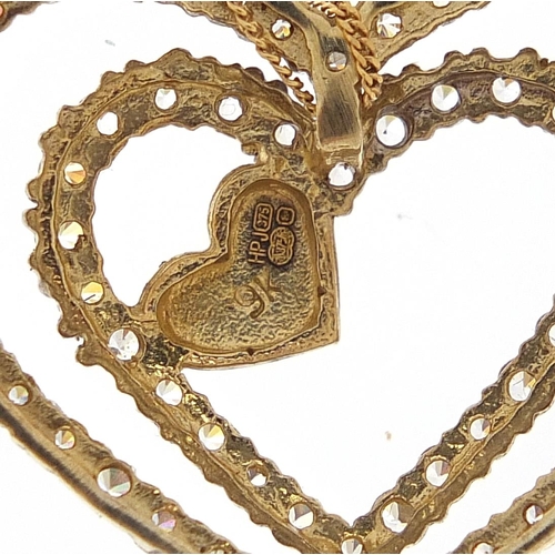 1693 - 9ct gold clear stone love heart pendant on 9ct gold necklace, 2.8cm wide and 46cm in length, 5.3g