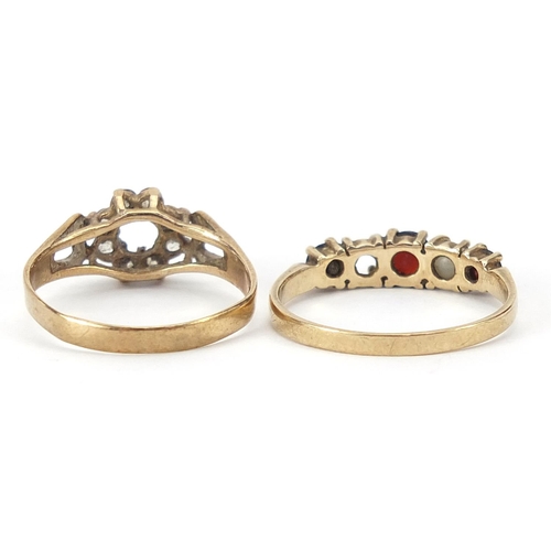 1738 - Two 9ct gold rings set with red and clear stones, the largest size O, 3.8g