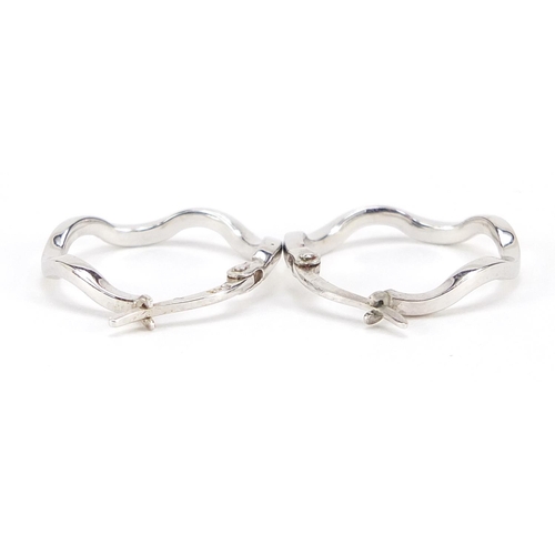 1965 - Pair of 9ct white gold hoop earrings, 1.8cm in diameter, 1.1g