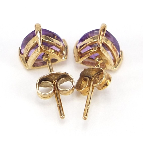 1747 - Pair of unmarked 9ct gold amethyst stud earrings, 7mm high, 0.9g