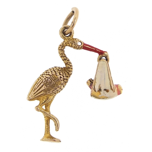 1991 - 9ct gold and enamel stork charm, 2.2cm high, 2.3g