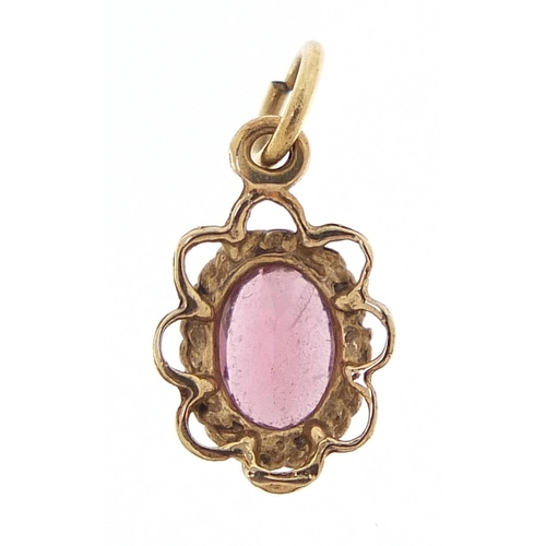 1947 - Unmarked 9ct gold pink stone pendant, 1.1cm high, 0.5g