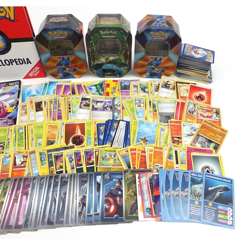 1510 - Pokemon collectables including trade cards, encyclopaedia and other trade cards