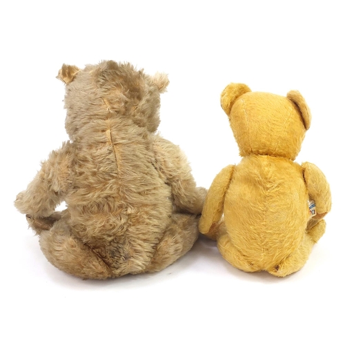 1481 - Two vintage golden jointed teddy bears, one straw filled, the largest 52cm high