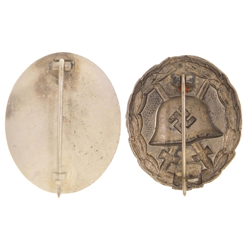 1549 - Two German military interest wound badges