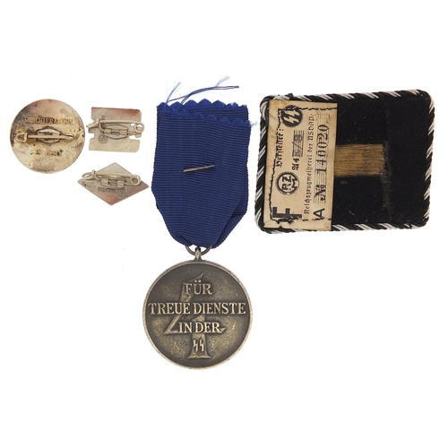 1553 - German military interest objects including three enamel badges, cloth patch and medal