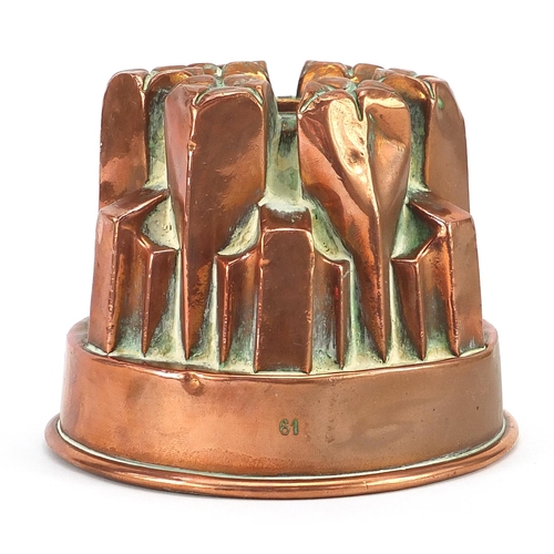 14 - Victorian copper jelly mould numbered 61, 11cm high