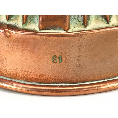 14 - Victorian copper jelly mould numbered 61, 11cm high