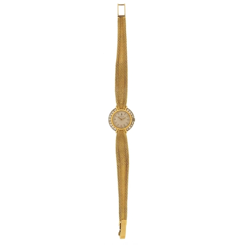 1674 - Corum, 18ct gold and diamond ladies wristwatch with 18ct gold strap, 20mm in diameter, 27.0g