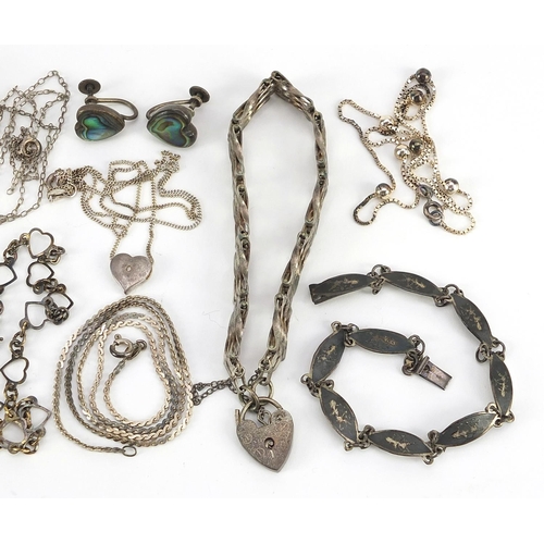 2158 - Silver jewellery including a gate bracelet with love heart padlock, Rennie Mackintosh style brooch, ... 