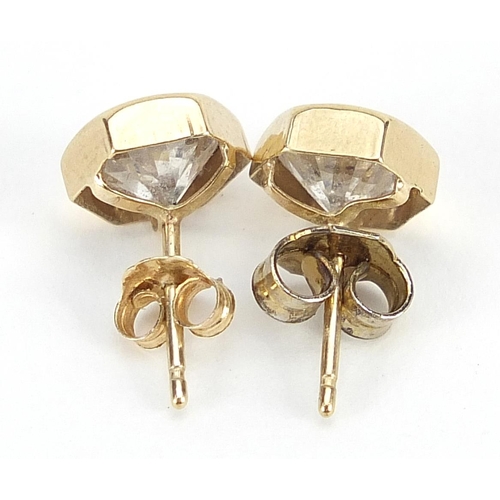 1953 - Pair of 9ct gold cubic zirconia stud earrings, 7mm in diameter, 1.6g