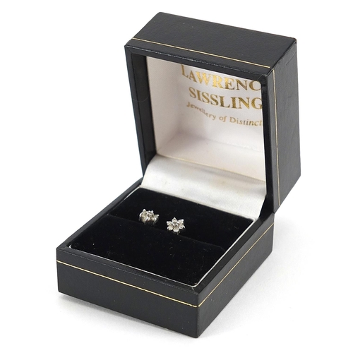 1792 - Pair of 9ct white gold diamond flower head stud earrings, 6mm in diameter, 0.8g