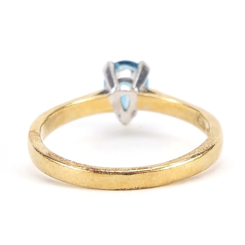 2092 - 18ct gold blue stone tear drop ring, size P/Q, 3.6g