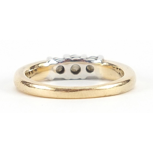 1699 - 14k gold diamond three stone ring housed in Wales & McCulloch London box, size N, 4.6g