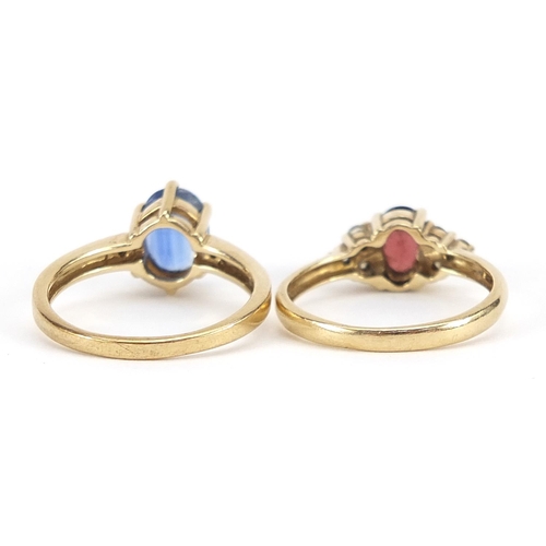 1850 - Two 9ct gold rings set with blue, red and clear stones, each size N, 5.2g