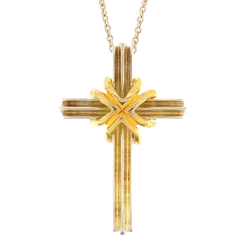 1974 - Tiffany & Co silver and 18ct gold cross pendant on a silver necklace with box, 3.3cm high and 42cm i... 