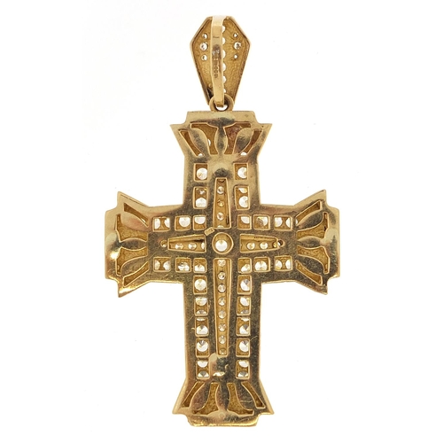 1629 - Large 9ct gold cross pendant set with clear stones, 8.5cm in length, 35.0g