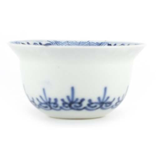 142 - Chinese blue and white porcelain tea bowl hand painted with flowers, character marks to the base, 6c... 