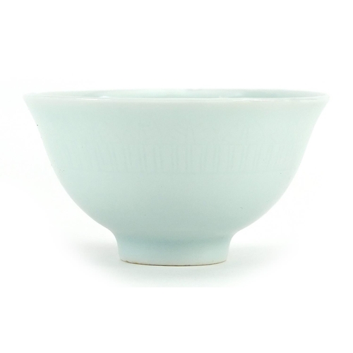 84 - Chinese porcelain tea bowl having a celadon glaze, four figure character marks to the base, 6.5cm in... 