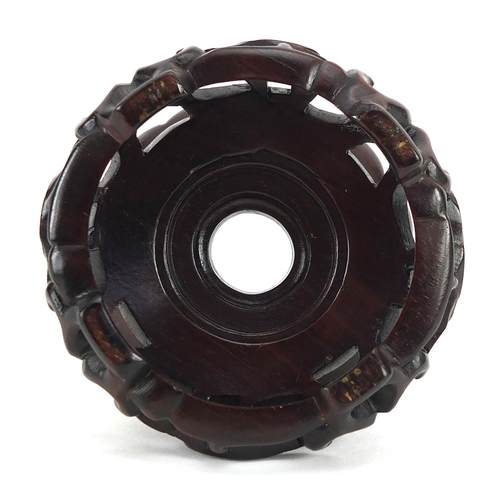 309 - Chinese carved hardwood stand, 8cm in diameter