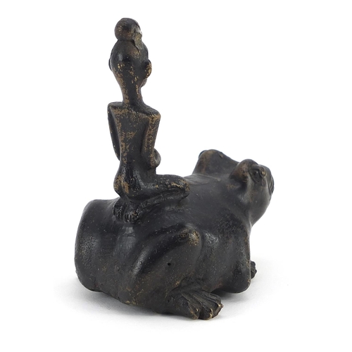 1283 - Tribal interest patinated bronze study of a tribesman on frog, 10cm high