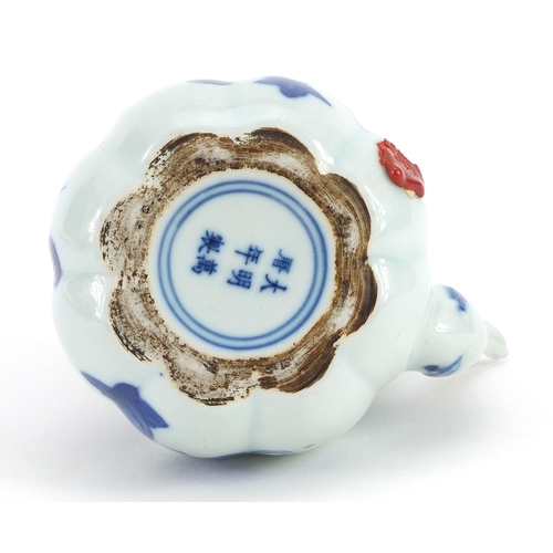 1290 - Chinese blue and white porcelain teapot hand painted with flowers, six figure character marks to the... 