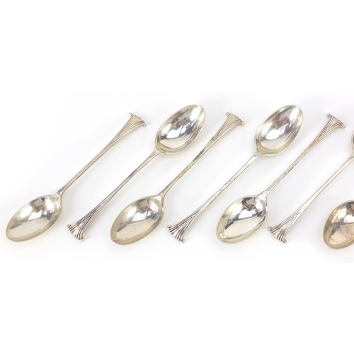2295 - William Hutton & Sons Ltd, set of twelve Victorian silver teaspoons, London 1900, 11cm in length, 15... 