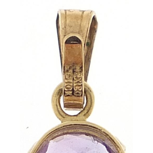 1981 - Ten carat gold amethyst pendant, 1.5cm high, 0.4g