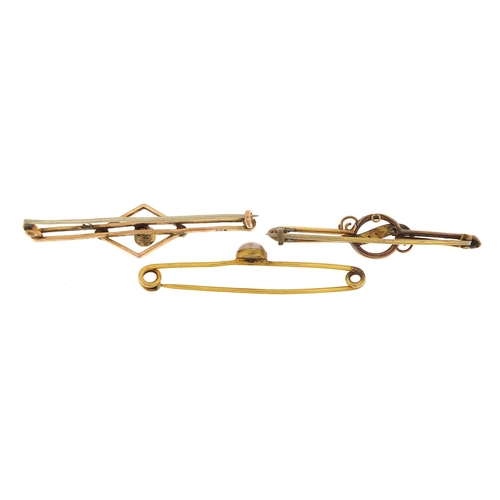 2056 - Three antique bar brooches, one marked 9ct gold set with pearls, the largest 5cm wide, total weight ... 