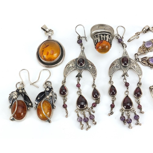 2106 - Silver semi precious stone jewellery comprising two pairs of earrings, two bracelets, pendant and ri... 