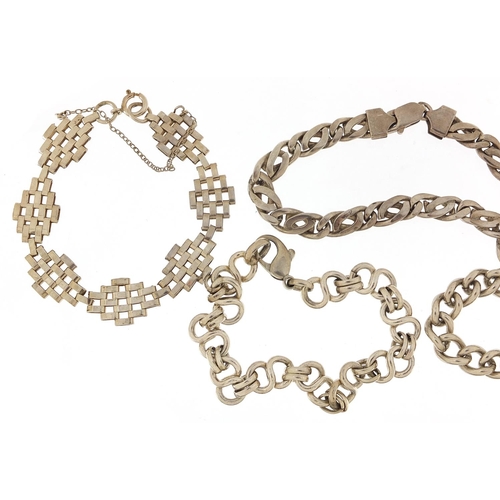 2057 - Five silver bracelets including a gate bracelet, 98.8g