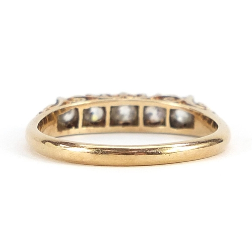 1670 - 18ct gold diamond five stone ring, the three central diamonds each approximately 3mm in diameter, th... 